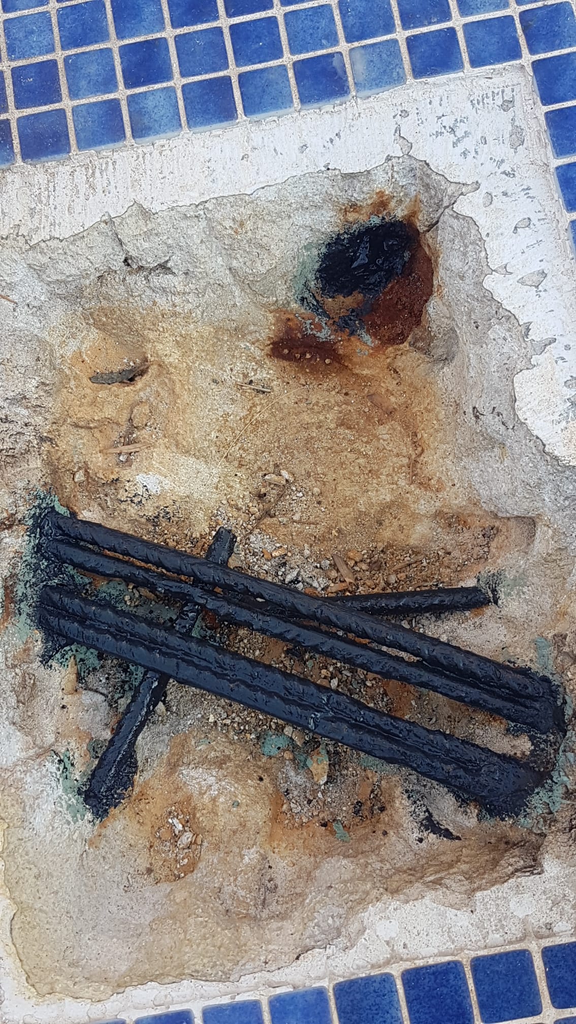 Close-up of rebar with anti-corrosion coating applied